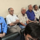 Sambuelli y Benítez, junto a otros represores durante el juicio.