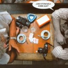 Una viñeta de la fotonovela en la que un fotógrafo sale a retratar el barrio de Once.